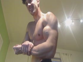 Hot German Muscle stud flexes and presses me over his head.