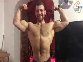 Hot and Vascular muscle guy flexing hard