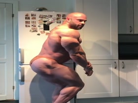 Massive Muscle Posing in the Kitchen