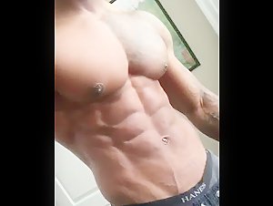 Can anyone put a name to this hot sexy muscle hunk with gorgeous pec and nips?