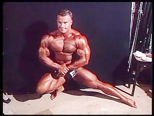 Young Ronny Rockel posing backstage