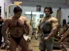 Romel posing in the gym