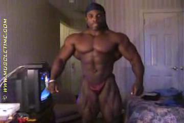 Big Guy posing in a hotel room