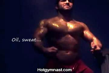 Gold dust covered stud posing 