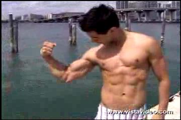 Close up of Alan flexing