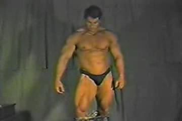 Bodybuilder dropping pants