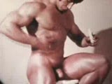 Vintage Bodybuilder Oils Up