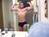 Eric poses in the bathroom
