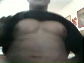 posing and masturbating