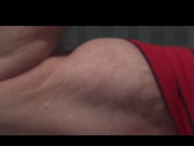 Flexing in Red Shirt