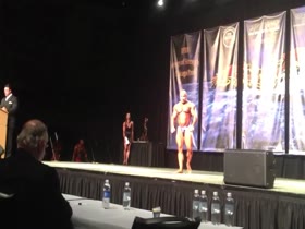 ROIDGUTTED BALD MUSCLEBULL IN SHINY PURPLE POSERS