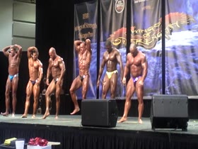 ROIDGUTTED BALD MUSCLEBULL IN SHINY PURPLE POSERS