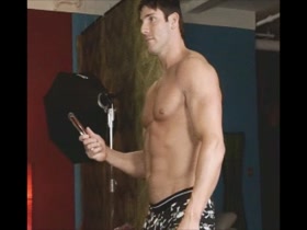 Muscle Boy Walker Plays With His Toys