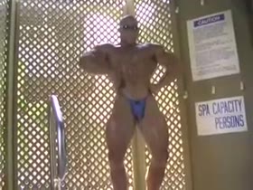 Bodybuilder Blue Thong Posing