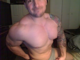 Jacked stud flexes post workout