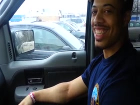 Huge biceps in a car