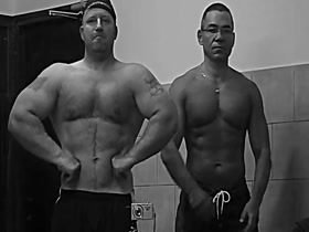 2 giant friends flexing