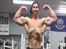 pumped bodybuilder flexing
