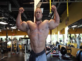 Aaron Clark Pumped Flexes in Gym