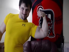 PowerBlue cocky flexing in yellow shirt