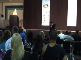 Brian Cage guest posing at bodybuilding show