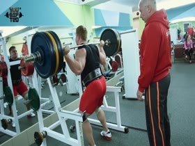 Bodybuilder working out in sexy outfit