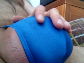 bulging in a tight lycra thong