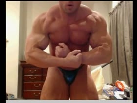 Mature bodybuilder flex