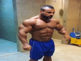 Big Galal locker room flexing