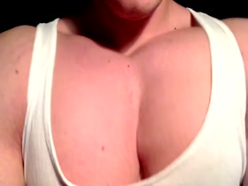 SKYWALKER II BOUNCES AND PLAYS WITH HIS BALLOON PECS.