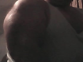 Massive Biceps in Undershirt