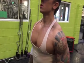 Young bodybuilder workout and posing