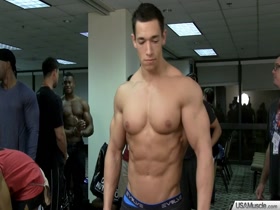Young Muscle God flexes huge peaks