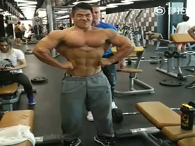 Gorgeous Chinese man flexing
