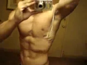 Young Alan Valdez posing ripped body