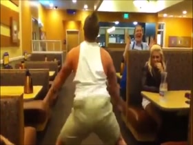 Bodybuilder Twerks In Restaurant