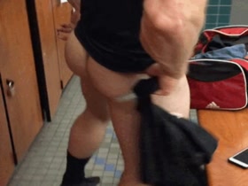 Muscle jockstrap in locker room