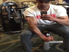 Ripped Muscle Jock Flexing in the Gym Mirror