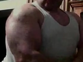 Big Massive Biceps in Undershirt