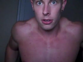 Young muscle god with huge arms flexing upper pecs