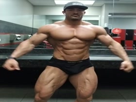 Garrett Coelho flexing