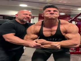 Andrei flexing and making suggestive noises