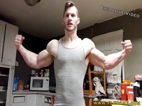 Huge Biceps ripping a shirt and flexing hard