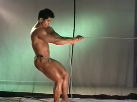 Asian artistic posing in very small suit - phwoooar!!!!