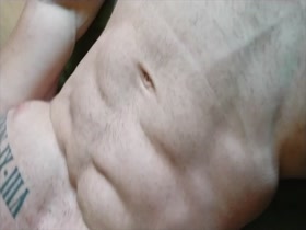 tattooed hunk jerks off