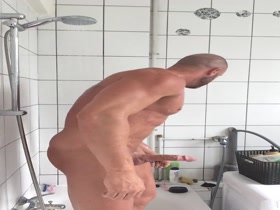 muscle stud jerks off in the shower