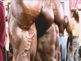 Bodybuilders Flexing