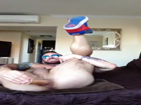 Muscle guy loves his dildo