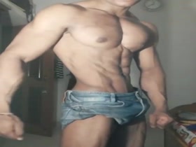 Fit Bodybuilder Indian Muscular Teen Flexes Perfect Chest and 8 Pack Abs