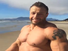 bodybuilder at beach